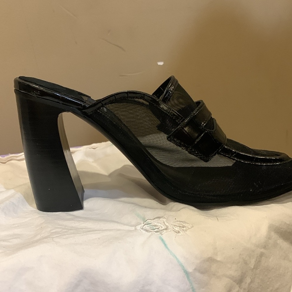 Black mesh penny lofer slide in shoe.